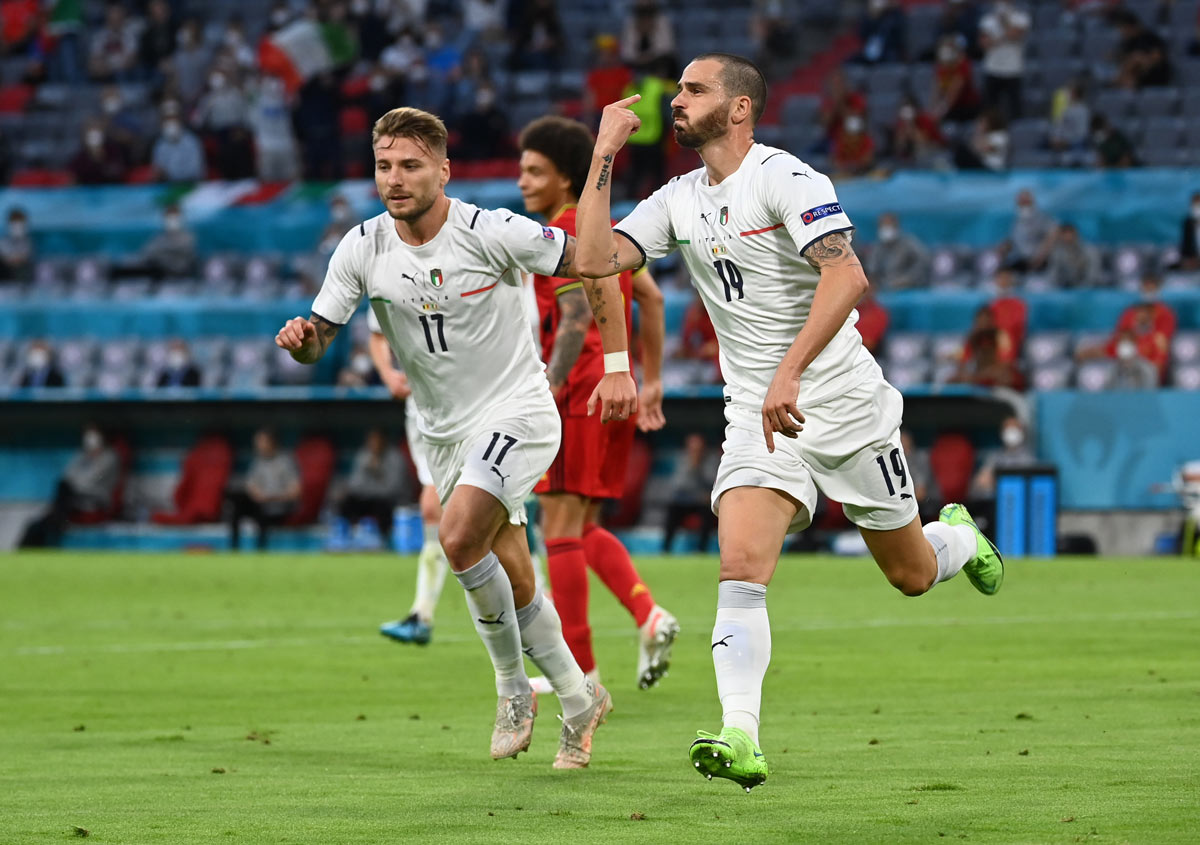 02 July 2021, Bavaria, Munich: Italy's Leonardo Bonucci (R) celebrates scoring his side's first goal that was disallowed due to an offside position during the UEFA EURO 2020 quarter-final soccer match between Italy and Belgium at the Allianz Arena. Photo: Federico Gambarini/dpa