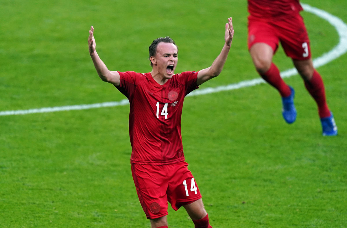 07 July 2021, United Kingdom, London: Denmark's Mikkel Damsgaard celebrates scoring his side's first goal during the UEFA Euro 2020 semi final soccer match between England and Denmark at Wembley Stadium. Photo: Mike Egerton/PA Wire/dpa