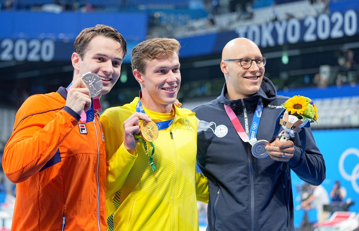 29 July 2021, Japan, Tokyo: (L-R) Netherlands' silver medallist Arno Kamminga, Australia's gold medallist Zac Stubblety-Cook and Finland's bronze medallist Matti Mattsson celebrate their medals at the award ceremony for the Men’s swimming 200m breaststroke final at Tokyo Aquatics Centre during the Tokyo 2020 Olympic Games. Photo: Michael Kappeler/dpa