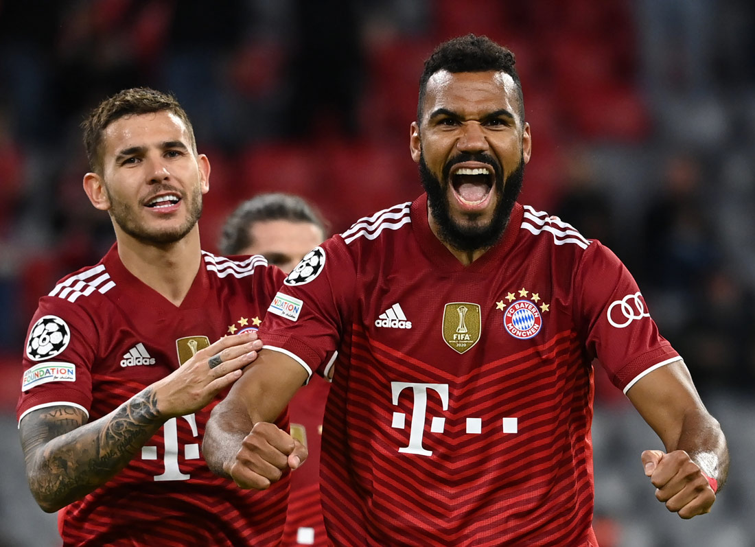 29 September 2021, Bavaria, Munich: Munich's Eric Maxim Choupo-Moting (R) celebrates scoring his side's fifth goal with teammate Lucas Hernandez during the UEFA Champions League group E soccer match between Bayern Munich and FC Dynamo Kyiv at Allianz Arena. Photo: Sven Hoppe/dpa