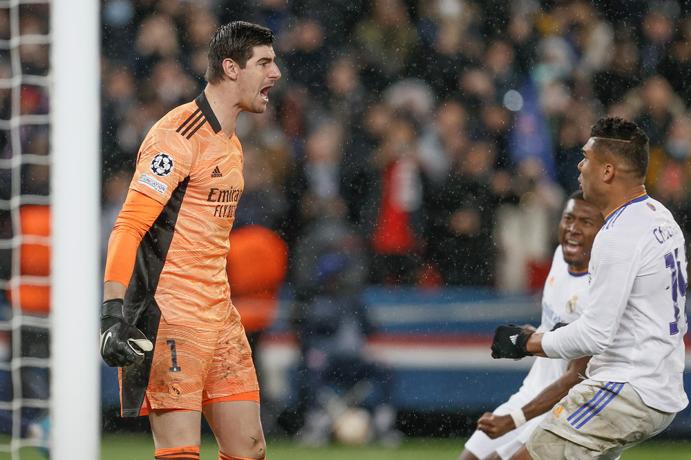 15 February 2022, France, Paris: Real Madrid goalkeeper Thibaut Courtois celebrates after saving a penality during the UEFA Champions League round of 16 first leg soccer match between Paris Saint-Germain and Real Madrid at Parc des Princes stadium. Photo: Bruno Fahy/BELGA/dpa.