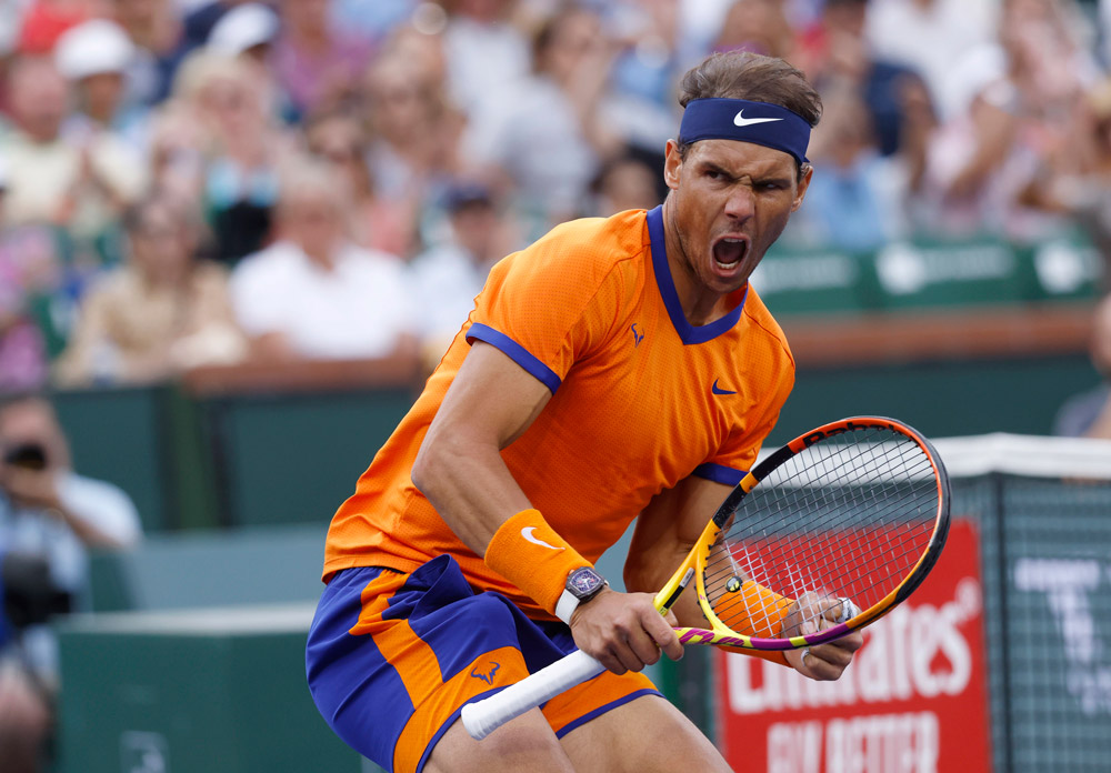 19 March 2022, US, Indian Wells: Spanish tennis player Rafael Nadal celebrates winning a point against Spain's Carlos Alcaraz during their Men's Singles Semi-final Tennis match of the Indian Wells Masters tennis tournament at Indian Wells Tennis Garden. Photo: Charles Baus/CSM via ZUMA Press Wire/dpa.