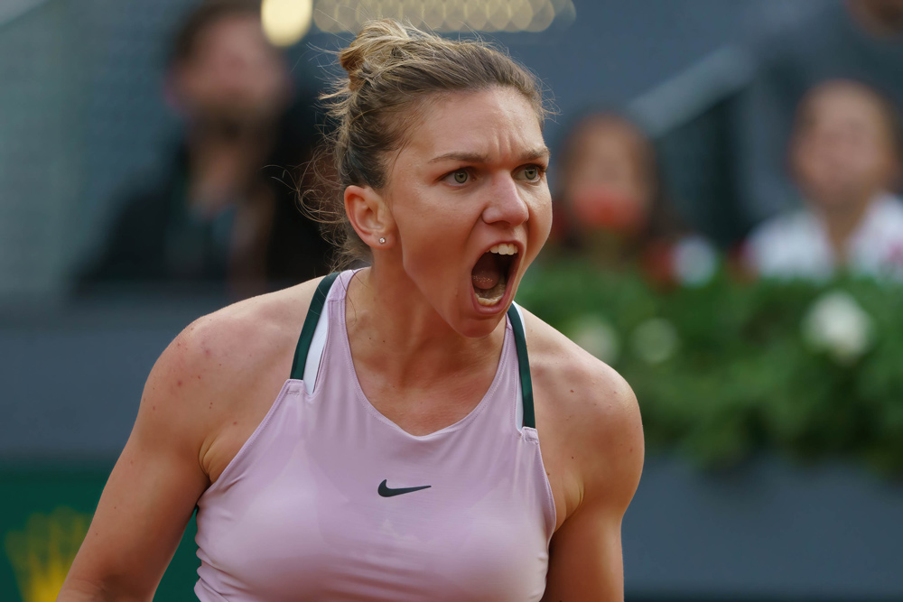 30 April 2022, Spain, Madrid: Romanian tennis player Simona Halep celebrates a point against Spain's Paula Badosa during their Women's Singles Round of 32 match in the Madrid Open Tennis tournament at La Caja Magica in Madrid. Photo: Atilano Garcia/SOPA Images via ZUMA Press Wire/dpa.