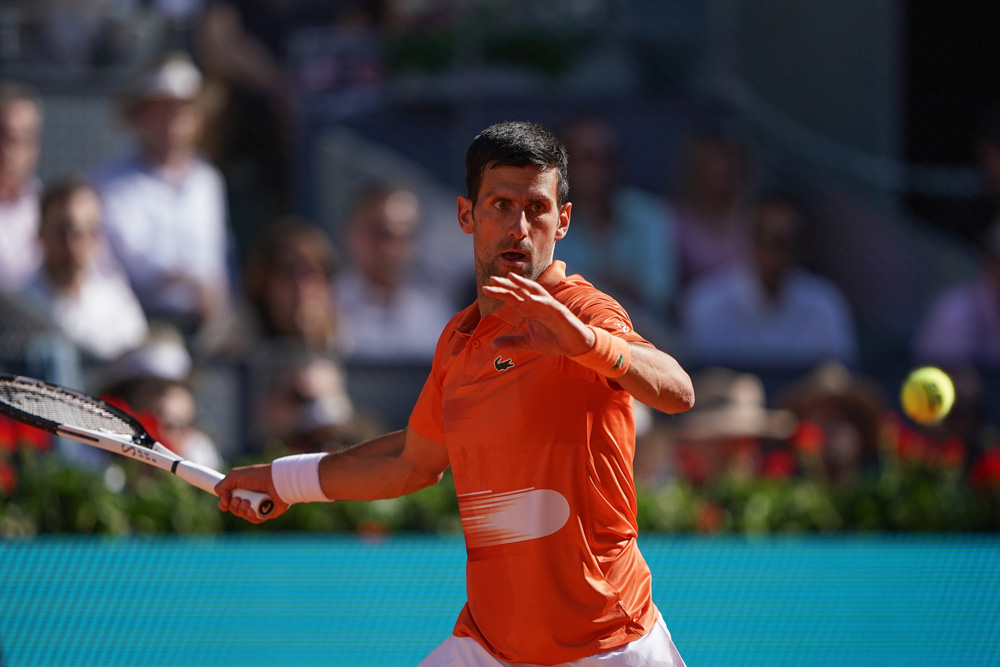 07 May 2022, Spain, Madrid: Serbian tennis player Novak Djokovic in action against Spanish Carlos Alcaraz during their men's singles semi-final match of the Madrid Open tennis tournament at the Manolo Santana stadium. Photo: Atilano Garcia/SOPA Images via ZUMA Press Wire/dpa.