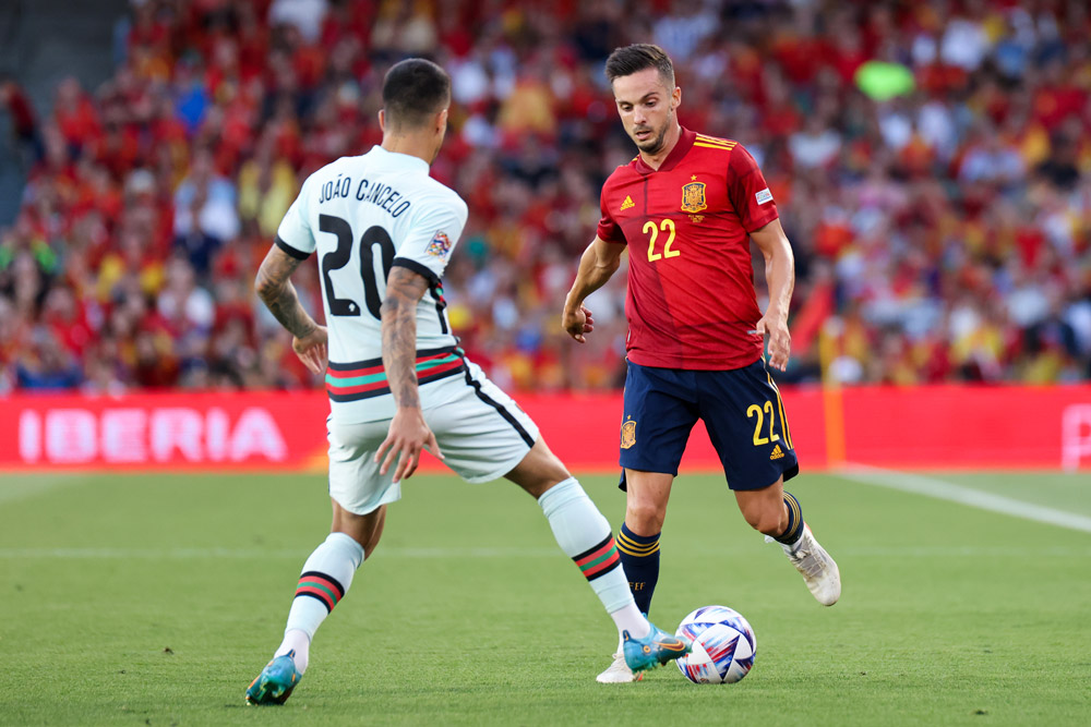 02 June 2022, Spain, Seville: Spain's Pablo Sarabia (R) and Portugal's Joao Cancelo battle for the ball during the UEFA Nations League group B soccer match between Spain and Portugal at Estadio Benito Villamarin. Photo: Jose Luis Contreras/DAX via ZUMA Press Wire/dpa.